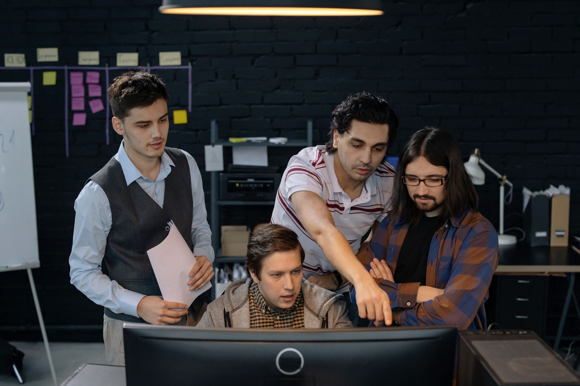 Cross-functional team collaborating on product delivery